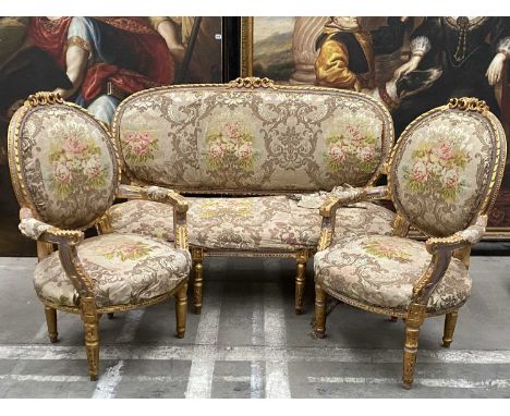 PARCEL-GILT & PAINTED SALON SUITE, in the 18th C. French style, comprising settee 106cms (h) and pair of armchairs, all in fl