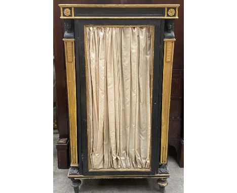 EGYPTIAN REVIVAL PARCEL GILT & EBONISED CABINET, with pleated silk panel door, 120 (h) x 66 (w) x 37cms (d)Comments: possibly