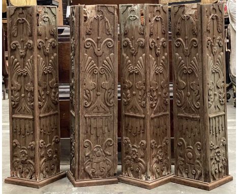 FOUR CARVED ARCHITECTURAL HARDWOOD ELEMENTS, possibly from lintel or doorway, each 88cms (h) (4)Provenance: The Cornelia Bayl