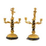 PAIR 19th C. FRENCH PARCEL GILT BRONZE FIGURAL CANDELABRA, musical putti surmounts above three