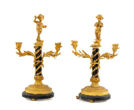 PAIR 19th C. FRENCH PARCEL GILT BRONZE FIGURAL CANDELABRA, musical putti surmounts above three acanthus branches, fluted circ
