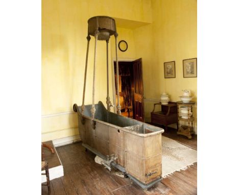 UNUSUAL & RARE VICTORIAN OVERHEAD SHOWER BATH, foliate carved and painted columns supporting cylindrical reservoir, sleigh-sh