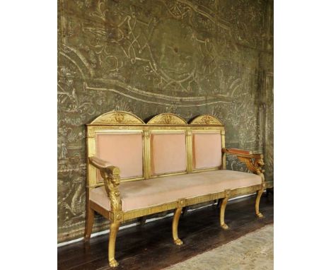 ITALIAN EMPIRE GILTWOOD SOFA, Rome, c. 1815, design attributed to Lorenzo Santi, triple arched toprail with eagles within oli