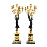 PAIR EMPIRE STYLE PARCEL GILT BRONZE CANDELABRA, five acanthus scrolled branches supported by winged