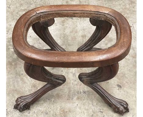 19TH C. FRENCH ROSEWOOD & MAHOGANY OVAL DRESSING STOOL, supported on carved lion's paw legs, 37 (h) x 57 (w) x 43cms (d)Comme