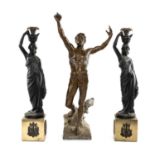PAIR OF PAINTED METAL FIGURAL CANDLEHOLDERS, modelled as Greek maidens on lacquered brass plinths,