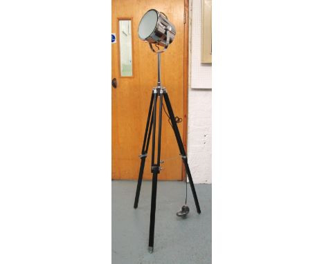SPOT LAMP, in a chromed metal on an extendable wooden tripod support, 173cm H.