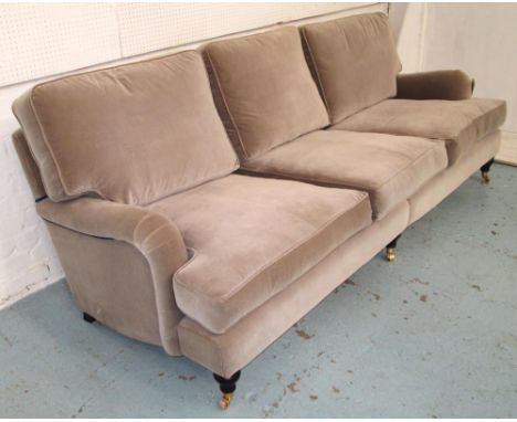 SOFA, of large proportions, with grey upholstery and blue piping to the back and sides on short turned front supports with ca