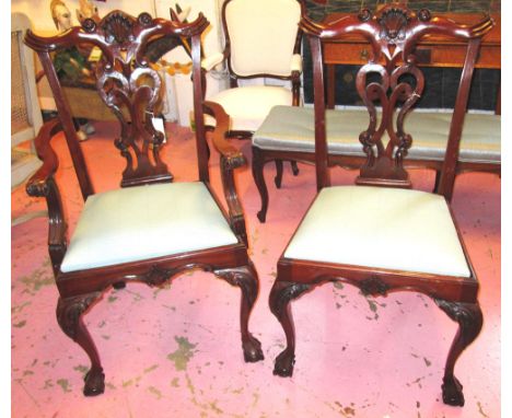 DINING CHAIRS, a set of eight including two carvers, in Chippendale style with carved mahogany showframes and drop in blue se