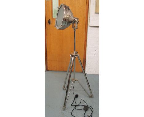 SPOT LAMP, in a chromed metal on an extendable tripod support, 129cm H.