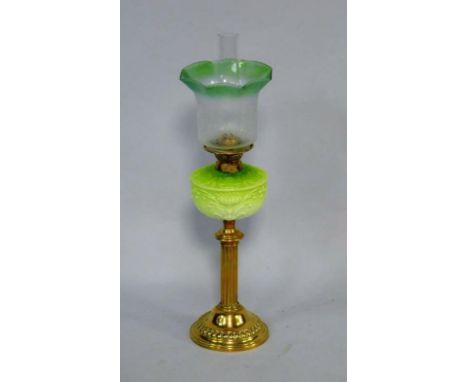 A Duplex late 19thC brass oil lamp, of fluted column form, with a floral moulded green opaline glass reservoir and a frosted 