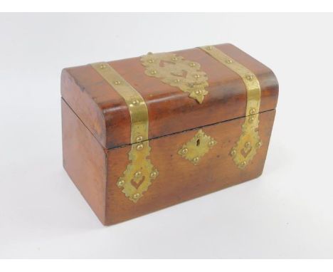 A Victorian walnut domed tea caddy, of twin division form with brass strap work and key escutcheon, 23cm x 13cm x 15cm.