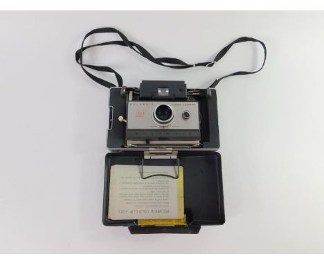 A Polaroid 101 Automatic Land Camera.