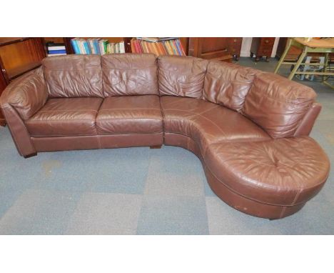 A brown leather four seater curved corner sofa, 284cm x 171cm.