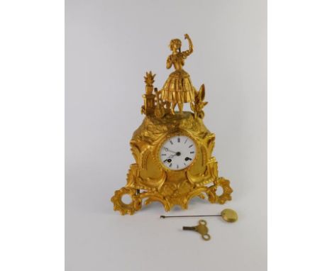 A French late 19thC gilt metal mantel clock, enamel dial bearing Roman numerals, Japy Freres et cie eight day movement, with 