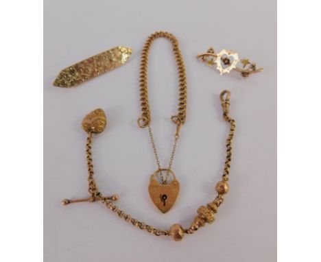 A Victorian foliate engraved lozenge shaped brooch, stamped 15ct, 4.9g, 9ct gold heart shaped brooch, Albert chain and a curb