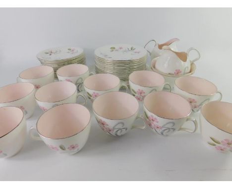 A Foley porcelain tea service decorated in the Sylphide pattern, designed by Donald Brindley, comprising a pair of bread plat