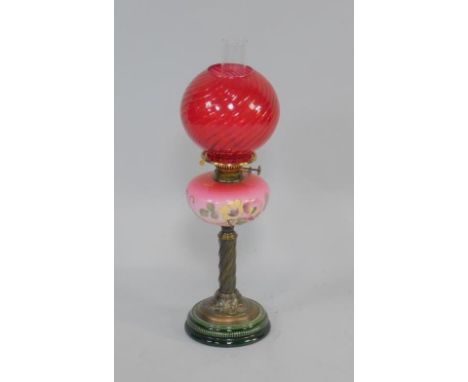 A Duplex late 19thC copper and green ceramic oil lamp, with Art Nouveau cast floral decoration, pink glass reservoir with ena
