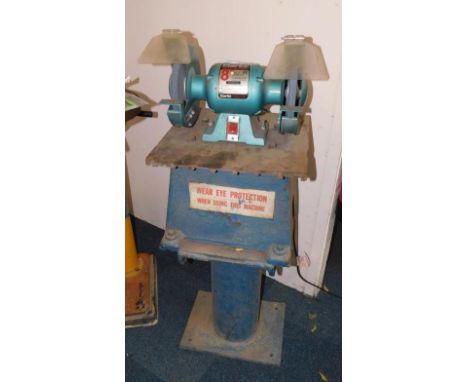 A Clarke metal worker 8" bench grinder, model CBG 8RSC.