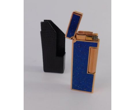 A Dunhill gold plated and blue lacquer pocket lighter,  with gold flecked decoration, cased, no 121577.