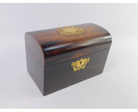 A Victorian coromandel domed tea caddy, of twin division form with brass shield plate and key escutcheon, 21cm x 12cm x 14cm.