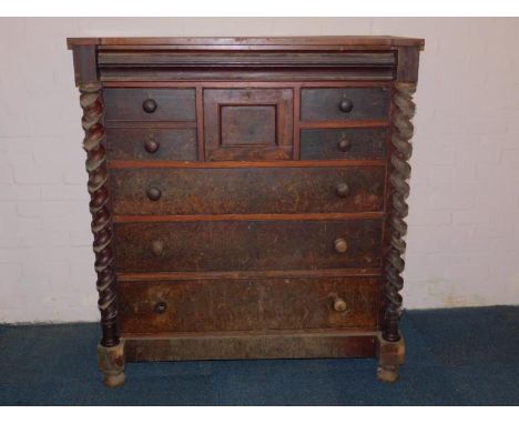 A Victorian Scottish mahogany chest of drawers, with a cushion drawer over one deep and four short drawers, above three long 