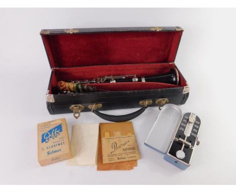 A Martin Freres ebony and plated clarinet, with mouthpiece, repair kit, circa 1956, cases, together with a Taktell Picolo met