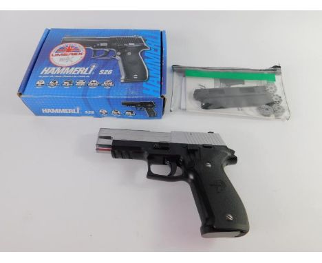 A Hammerli 526 air pistol, with rear sight and rotary magazine, boxed.