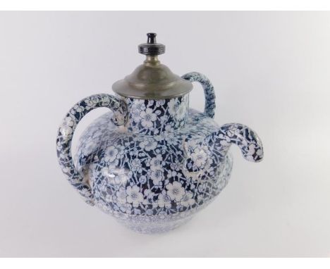 A Doulton Royles patent self pouring teapot, printed in blue with prunus blossom, no 6327, 1886, printed marks.