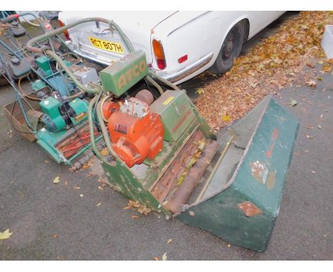 An Atco Groundsman 928 lawn mower, with a Tecumseh engine, ride on seat and roller.