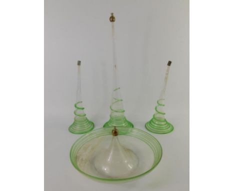 A Victorian clear glass epergne base with green tailed decoration, and three matching trumpets, largest 43.5cm high.