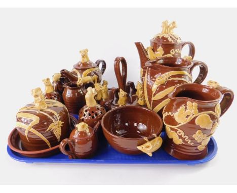 A group of David Cleverly Haytown Pottery, moulded and slip decorated with white against a brown ground, comprising coffee po