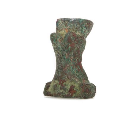 TWO SMALL ANCIENT EGYPTIAN BRONZES,both 26th-27th Dynasty, circa 664-545 B.C., the first a rare amulet cast as a calf's hoof,