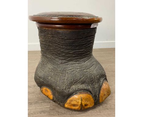 EARLY 20TH CENTURY TAXIDERMY ELEPHANT'S FOOT STOOL,the hinged top with studded leatherette seat enclosing a removable section