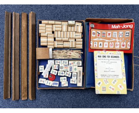 A Mahjong Set - Housed in a small cardboard brief case. 