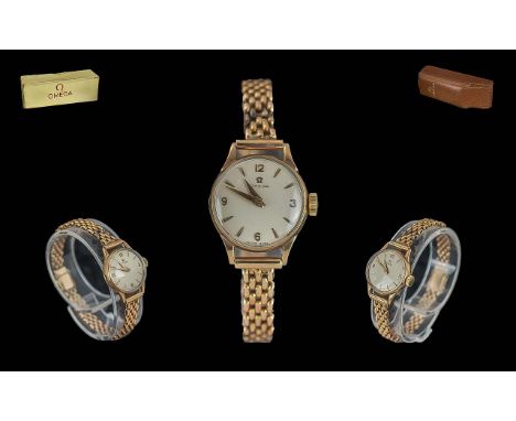 Omega Ladies 9ct Gold Mechanical Wrist Watch, Watch Case and Bracelet Marked 9.375. c.1960's. With Omega Brown Leather Watch 
