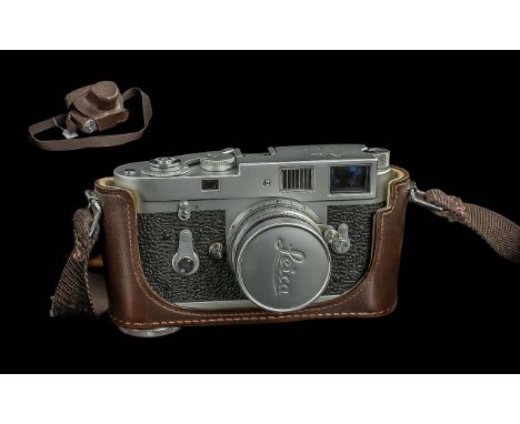 Leica-MZ 1069-861 Ernst Leitz Camera, with leather camera case and strap.  All aspects of condition excellent.