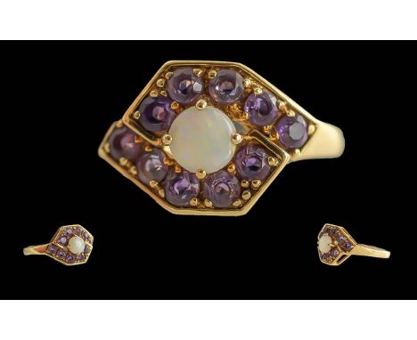 Ladies 9ct Gold Opal and Amethyst Set Cluster Ring, Full Hallmark to Interior of Shank. The Central Opal Surrounded by 8 Smal