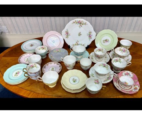 Royal Albert Part Tea Set - Comprising assorted patterns cups, saucers and a cake plate. 