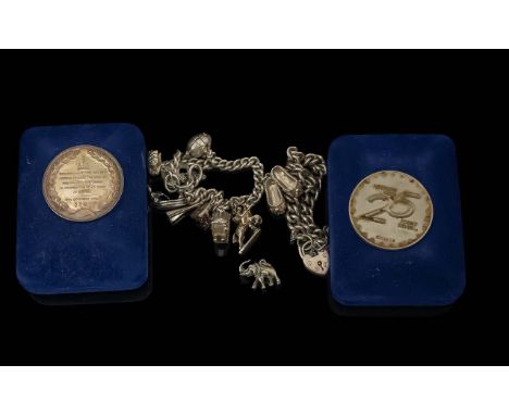 Small Collection of Silver Jewellery, to include two Unipart Silver coins to commemorate the visit of HM Queen Elizabeth II i