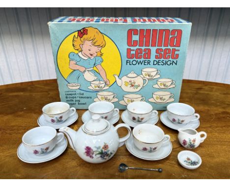 Vintage Child's China Tea Set, floral design, contains teapot, milk jug, sugar bowl, six cups and saucers, all in original bo