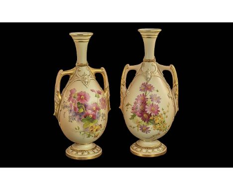 Royal Worcester Fine Pair of Handpainted Blush Ivory Two Handled Vases.  Decorated with images of spring flowers on ivory gro