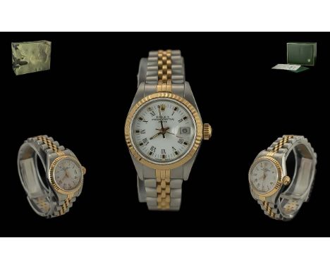 Rolex Ladies 18ct Gold and Steel Oyster Perpetual Date Wrist Watch. Model No 69173. Date of Purchase 20-8-1986, With Rolex Bo