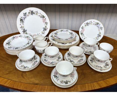Royal Worcester Part Dinner Service - With Floral Decoration and Gilt Borders. Comprising dinner plates, side plates, soup bo