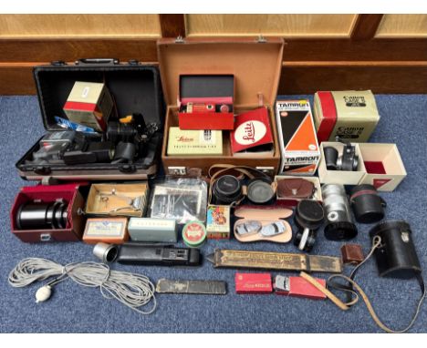 Large Collection of Vintage Camera Accessories, including Canon A1 body with accessories and case, Leica Lens 90mm, Leica Tel