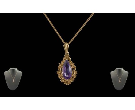 Ladies Pleasing 9ct Gold Single Stone Amethyst Set Pendant, with matching 9ct Gold Chain.  Both marked for 9ct.  The faceted 