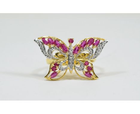 Burmese Ruby Butterfly Ring, marquise cut rubies, with the pinkish red tone typical of Burmese rubies, set in a 14ct gold ver