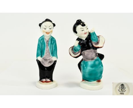 Royal Worcester Hand Painted Chinese Figures (2). 1. Chinoiserie Boy' RW3354, modeler Gwendolen Parnell, issued 1941. Height 