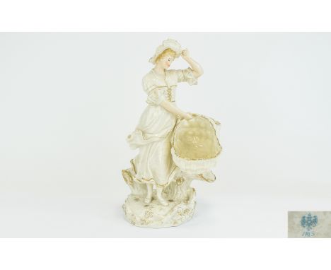 German Porcelain Figure of a Young Woman, carrying a large woven basket, the woman holding onto her wide brimmed hat as her s