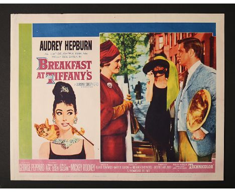 Artist: Robert McGinnisUS Lobby Card #8 from the set for "Breakfast At Tiffany's" (1961). What makes this particularly appeal